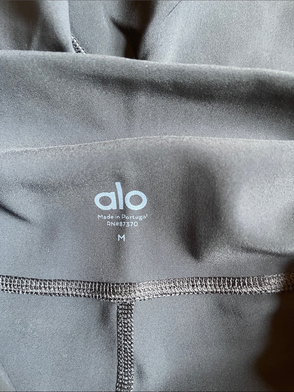 ALO Yoga Black High-Rise Bike Shorts with Side Strap Details - Picture 3 of 4